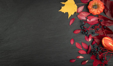 Minimal autumn mockup with black stone background, leaves and pumpkins flat lay. Top view fall...