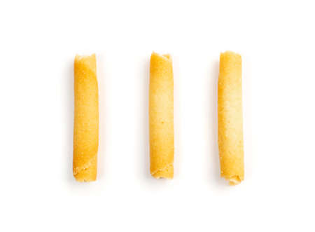 Crunchy Wafer Sticks Isolated on White Background. Crispy Long Biscuit Fingers, Cookie Tubes, Rolls, Sweet Sugar Bakeryの写真素材
