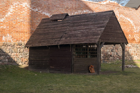 Czersk, Poland - March 5, 2021: Wooden house in the courtyard of Mazovian duke castle in Czersk....