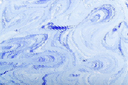 Blue ice texture background. Frosty surface pattern, abstract glass distortion wallpaper with copy spaceの写真素材