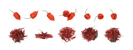 Heap of Dry Red Chili Peppers, Black and Pink Pepper Isolated on White Background Top View....