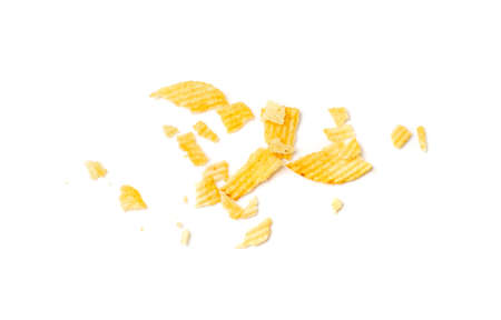 Broken potato chips isolated. Crumbed potato snack, fast food snacks crumbles and pieces on white backgroundの写真素材