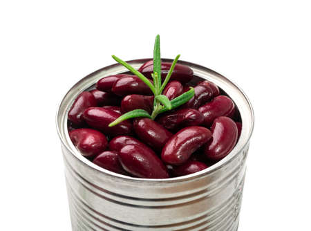 Red kidney beans in a tin can isolated. Cooked bean pile, baked legume, canned red beans, rajma, Phaseolus vulgaris, leguminous salad ingredient on white backgroundの写真素材
