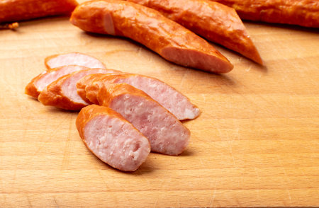 Smoked sausage cut. Hunting salami slices, chorizo pieces, wurst, poland kielbasa, grilled frankfurt...