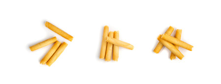Crunchy Wafer Sticks Isolated on White Background. Crispy Long Biscuit Fingers, Cookie Tubes, Rolls,...