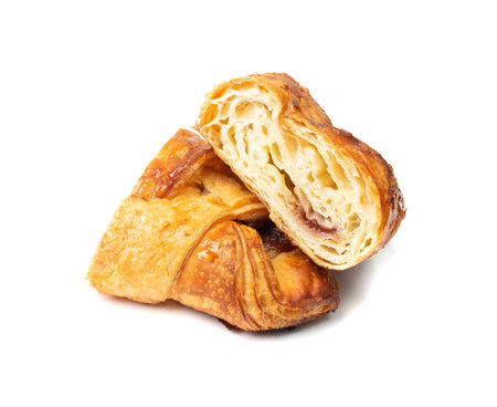 Butter croissant cross section, showing texture. Puff pastry pie isolated, sweet kipferl cut, buttery flaky viennoiseries, layered yeast leavened dough pastry on white backgroundの写真素材