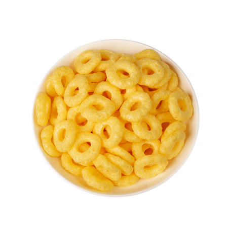 Corn rings pile isolated. Cereal puffs with spices, round crunchy puffed snacks, breakfast corn...
