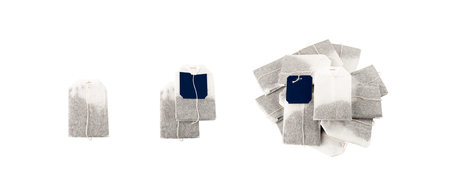New Tea Bag with Blank Tag Set Isolated. Teabag Mockup, Tea Bag with Paper Label on White...