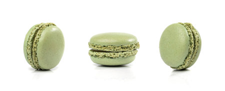 Green Macaron Cake Isolated, Macaroon Cookie, Almond Meringue, Sweet Macaroons, Colorful French Dessert on White Backgroundの写真素材