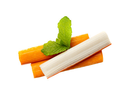 Crab Stick Pile Isolated, Orange Crabstick Closeup, Crabmeat Food, Crabmeat Fish Sticks, Surimi Seafood, Crab Sticks on White Background, Clipping Pathの写真素材