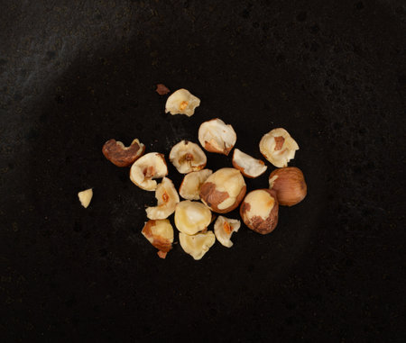 Nut Kernels, Hazelnuts Pile on Plate, Healthy Organic Nuts Group, Nut Kernels on Black Background Top Viewの写真素材