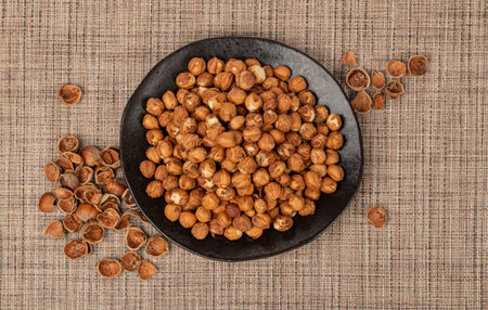 Nut Kernels, Hazelnuts Pile on Plate, Healthy Organic Nuts Group, Nut Kernels on Rustic Background...