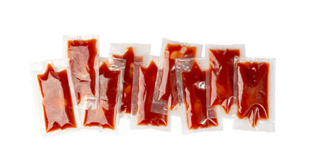 Ketchup in Square Plastic Bag Isolated, One-Time Portion Transparent Catsup Sachet, Hot Tomato...