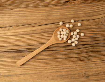 Cherry Stones, Cherry Core Closeup, Sweet Fruit Kernels, Cherries Pits, Dry Prunus Avium Small Seeds, Stone Fruit Pits on Wooden Table Backgroundの写真素材