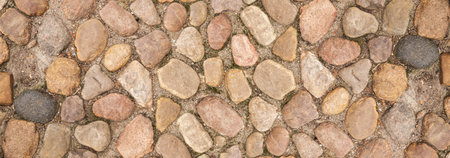 Old Brown Pavement Top View or Granite Cobblestone Road. Ancient Brick Cobblestoned Floor or...