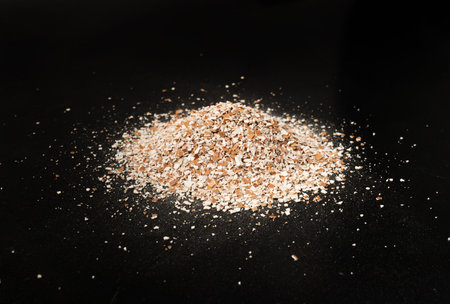 Broken Egg Shell Isolated, Crushed Eggshell, Calcium Supplement, Cracked Eggshells, Natural Compost Ingredient, Broken Egg Shells Pile on Black Background Top Viewの写真素材