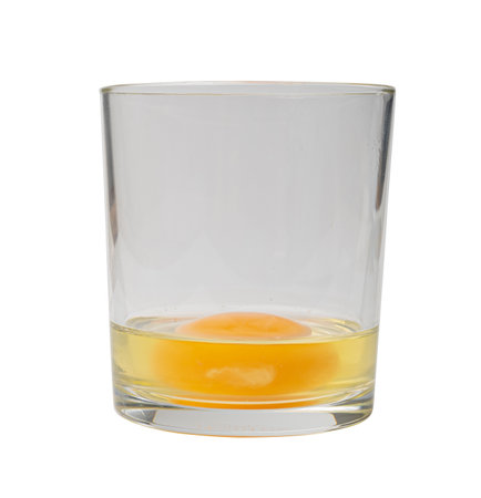 Broken Egg in Glass Isolated, Raw Yolk and White, Cracked Brown Shell, Fresh Broken Organic Chicken Eggs on White Backgroundの写真素材