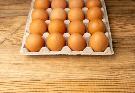 Egg Tray on Wooden Rustic Background, Twenty Brown Eggs Pack, 20 Fresh Organic Eggs in Paper...