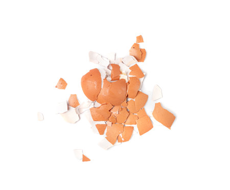 Broken Egg Shell Isolated, Crushed Eggshell, Calcium Supplement, Cracked Eggshells, Natural Compost Ingredient, Broken Egg Shells on White Background Top Viewの写真素材
