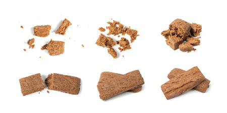 Chocolate Halva Pieces Pile Isolated, Sunflower Halawa, Halvah or Halwa with Sunflower Seeds on...