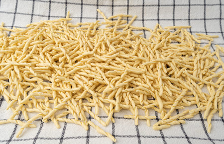 Raw Trofie Pasta, Drying Noodles on a Linen Napkin, Dry Italian Macaroni, Traditional Genoa Food,...