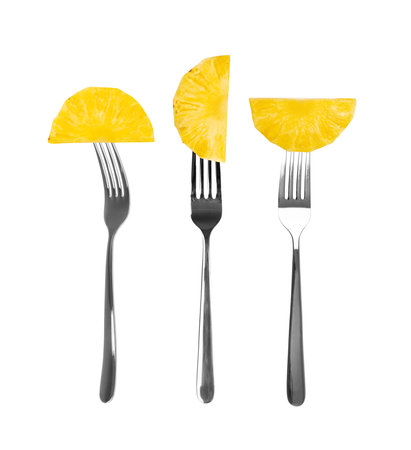 Pineapple Cuts on Forks Isolated, Raw Pineapple Pieces, Comosus Tropical Fruit Chunks, Ripe Pine Apple Slices of Pulp, Pineapple Fruit on White Backgroundの写真素材