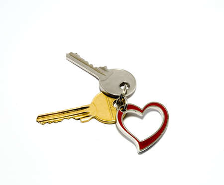 Two key holders and a heart, symbol of love and の写真素材