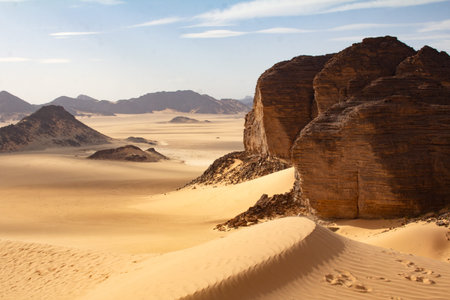 Sahara desert with rocks and mountains