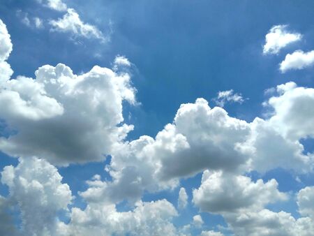 Blue sky and white cloud backgrounds and textures closeup for wallpaper interior design. Nature create very beautifully.の写真素材