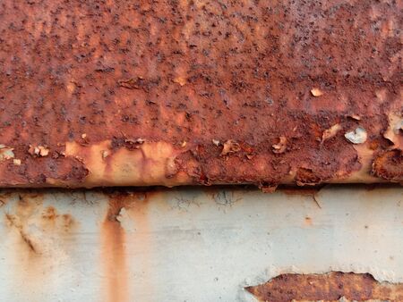 Rusty steel plate is caused by the reaction between oxygen and iron. It is a type of corrosion, moisture and oxygen.の写真素材