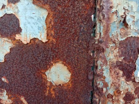 Rusty steel plate is caused by the reaction between oxygen and iron. It is a type of corrosion, moisture and oxygen.の写真素材