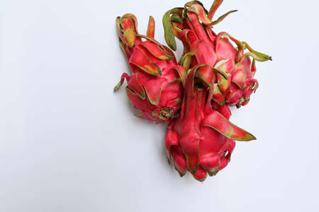 Dragon fruits with copy space isolated on white background closeup.の写真素材