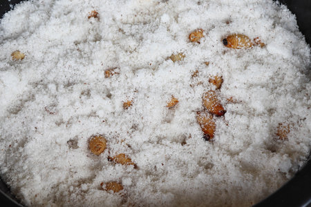 Preparation of rice with dried apricots and raisins