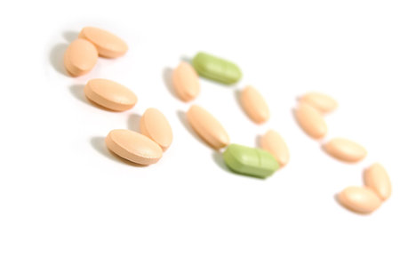 need help, word sos from pills over whiteの写真素材