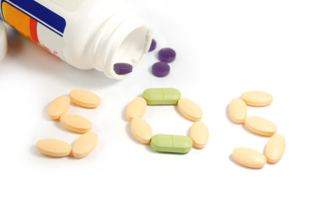 need help, word sos from pills over whiteの写真素材