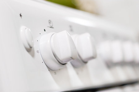 front detail of modern white cooker, selective focusの写真素材