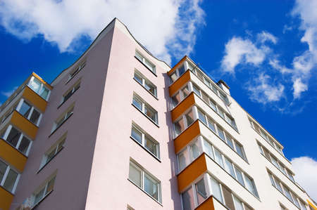 new apartment building over blue sky new apartment building over blue sky