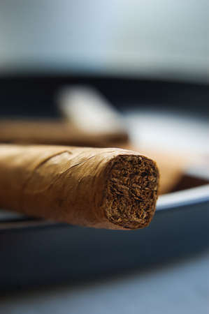 A cigar in ashtray, selective focusの写真素材