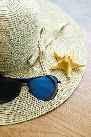 Hat, sunglasses and shells, summer conceptの写真素材