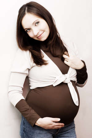 Smiling pregnant woman, third trimesterの写真素材