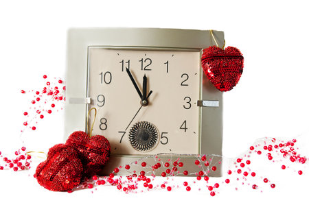 Clock and Christmas decorations over whiteの写真素材