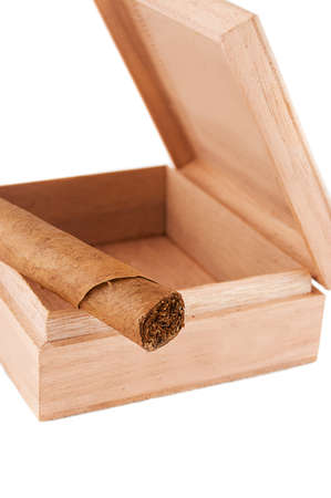 One left cigar in wooden box over whiteの写真素材