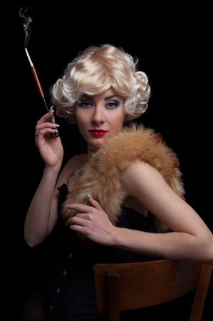 Blond retro-styled woman with cigarette over black