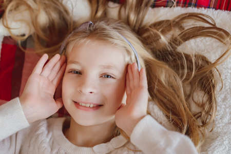 Teen girl openning her face with palmsの写真素材