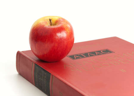 Book on the anatomy of man and the apple.の写真素材