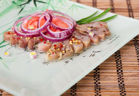 Herring with the spices, the ginger and the bow の写真素材