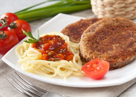 Cutlets with the vermicelli and the sauce 