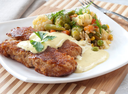 Sirloin of fish in the blocks with the vegetables の写真素材