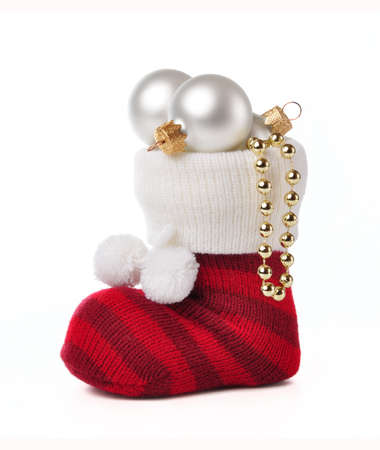 Sock with Christmas toys on a white background.の写真素材