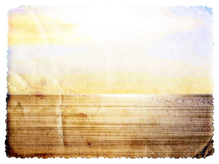 Pastel colored vintage textured card with carved edge isolated on whiteの写真素材